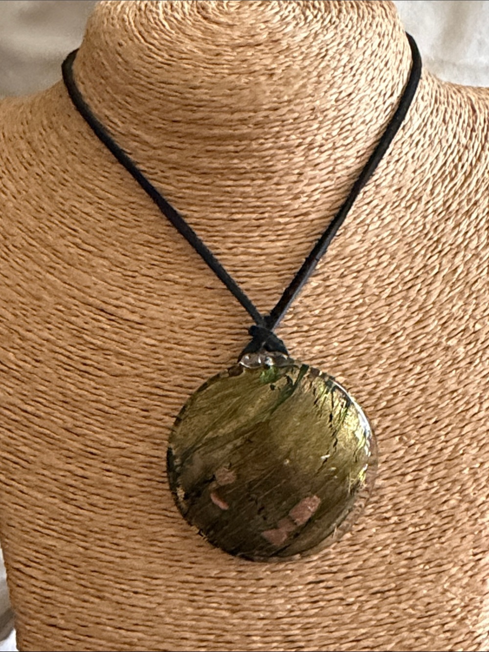 Large round blown glass pendant green and gold on brown leather cord